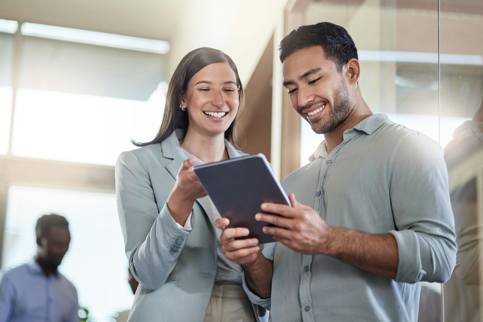 im so glad i found you shot of two coworkers talking while using a digital tablet  DigitalAmy im so glad i found you shot of two coworkers talking while using a digital tablet